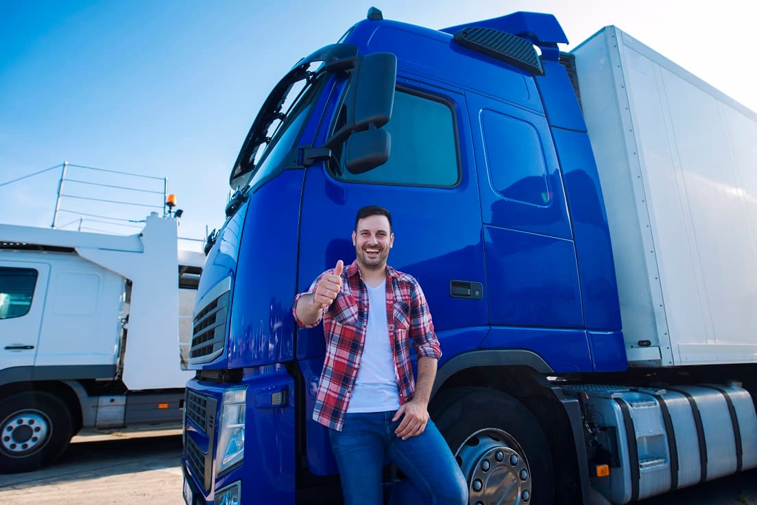 Truck driver giving thumbs up